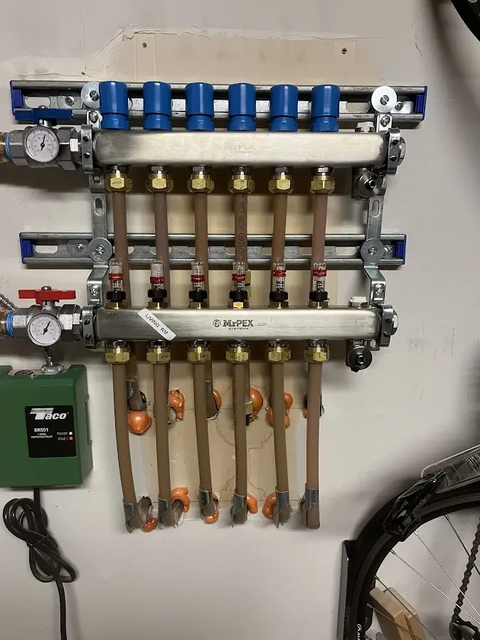 Plumber performing Water Heater Repair at a residential property in Lake City